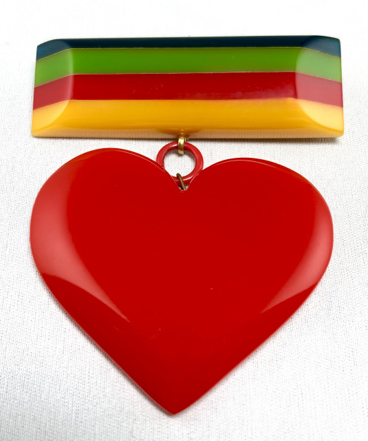SZ57 Shultz laminated bakelite bar/red heart pin